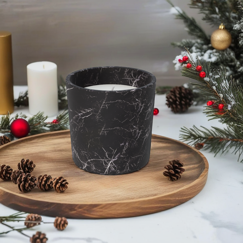 Marble scented cup with a candle inside